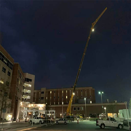 Installing rooftop AC units at CRMC